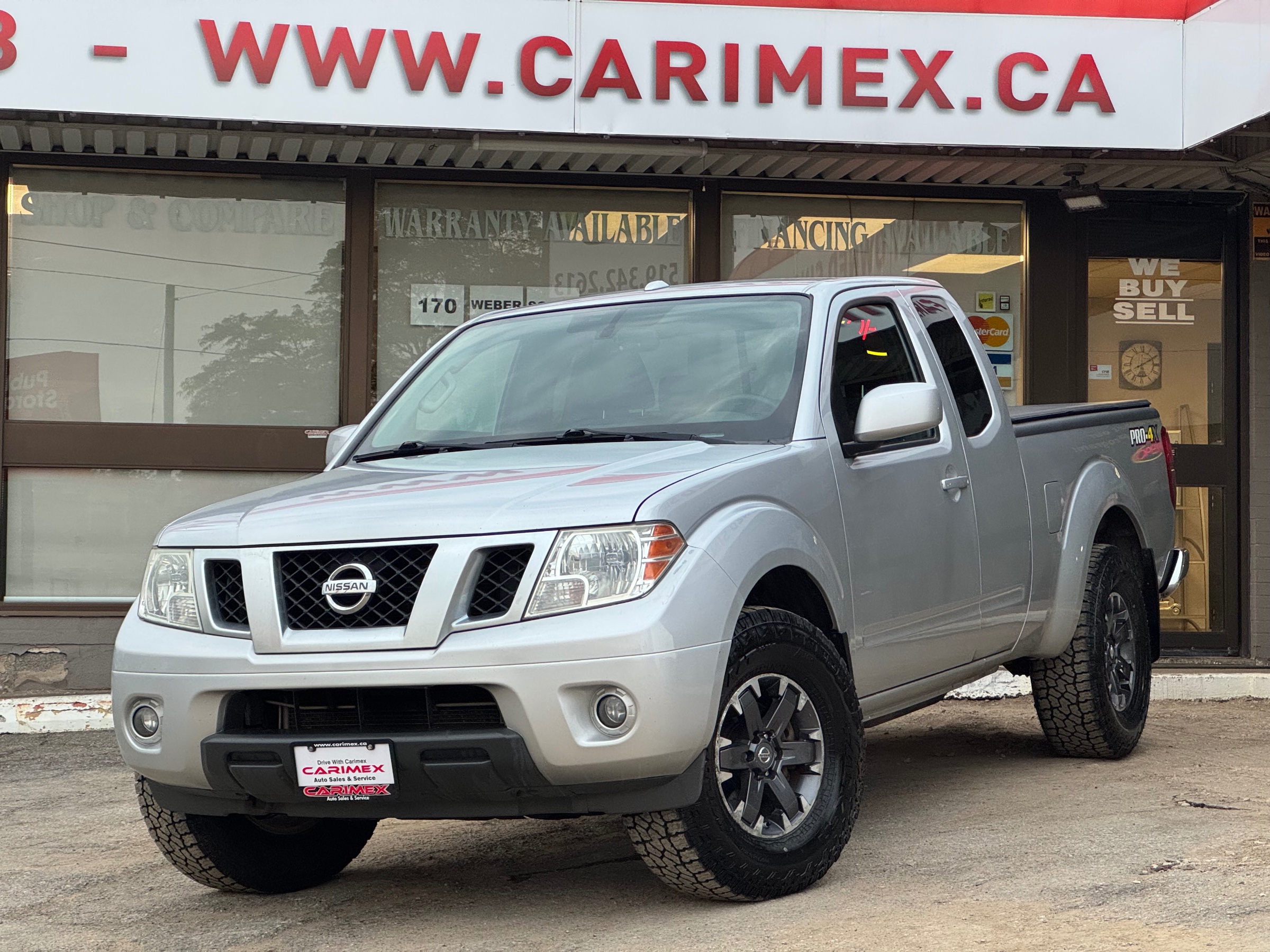 Silver 2015 Nissan Frontier Pickup Truck Four-Wheel Drive 6-Speed Manual