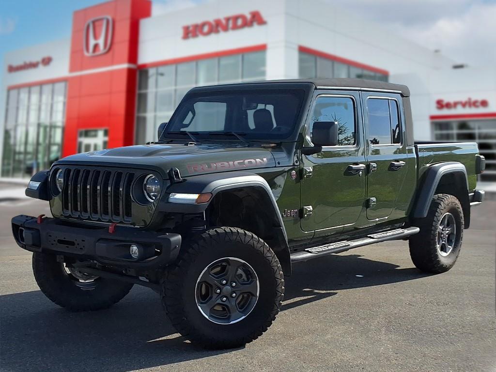 Green 2023 Jeep Gladiator Pickup Truck Four-Wheel Drive 6-Speed Manual