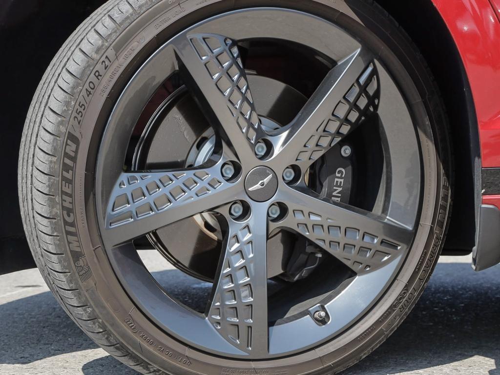 used 2023 Genesis GV70 car, priced at $53,597