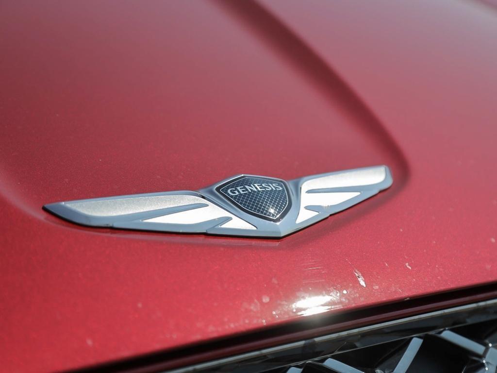 used 2023 Genesis GV70 car, priced at $53,597