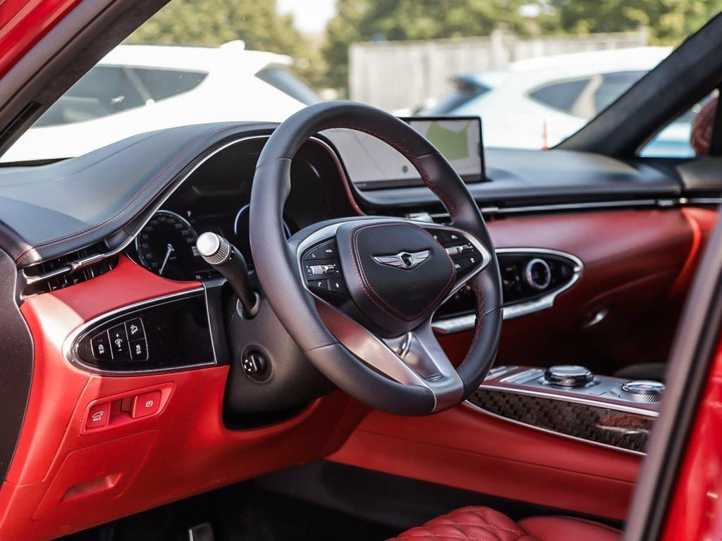 used 2023 Genesis GV70 car, priced at $53,597