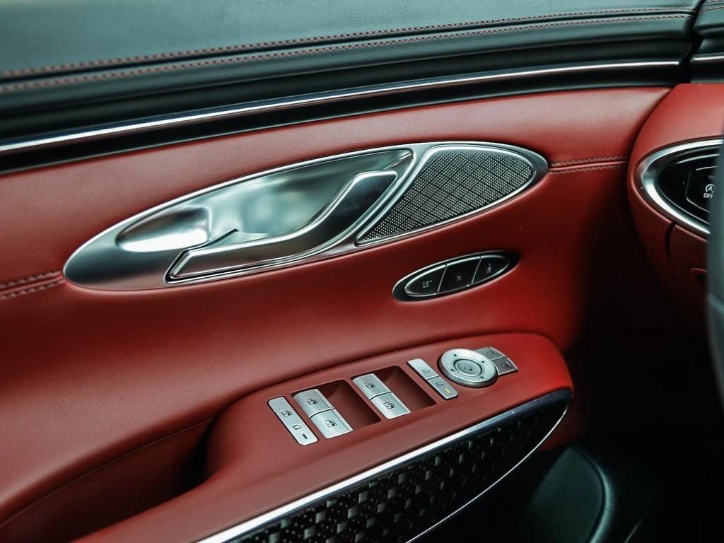 used 2023 Genesis GV70 car, priced at $53,597