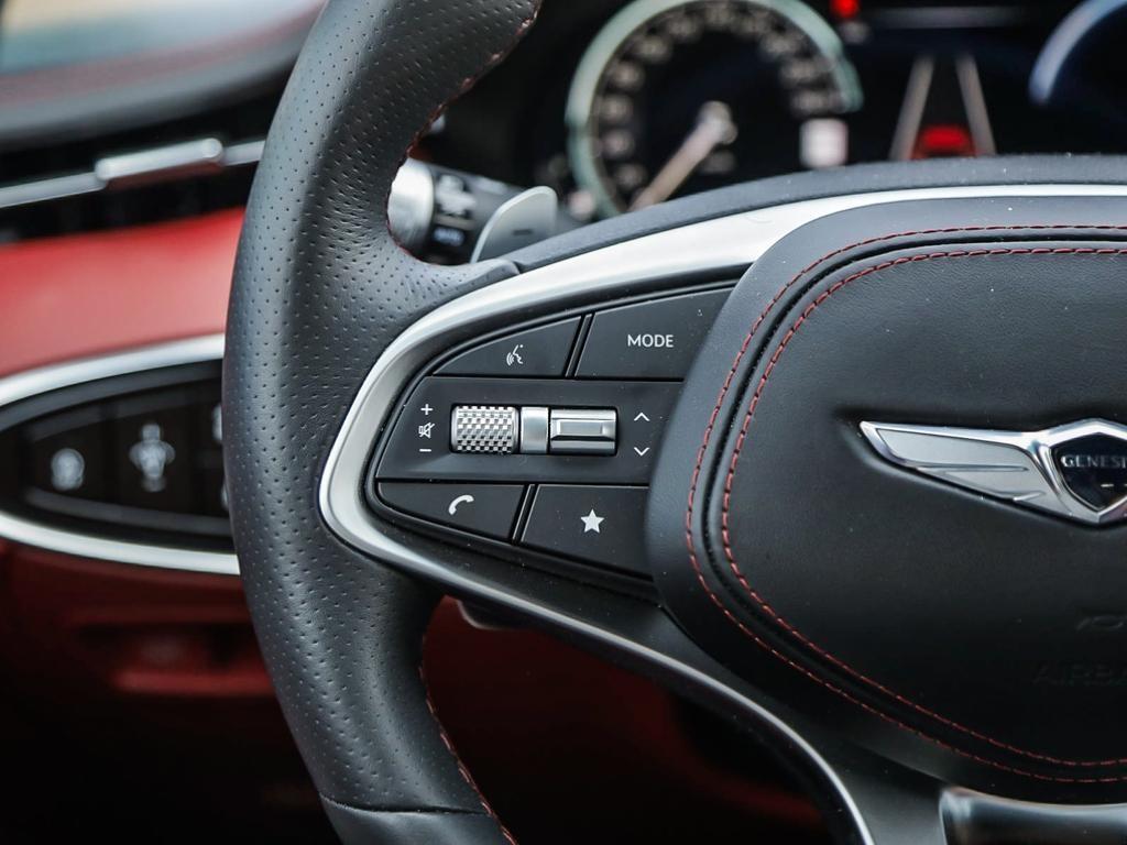 used 2023 Genesis GV70 car, priced at $53,597