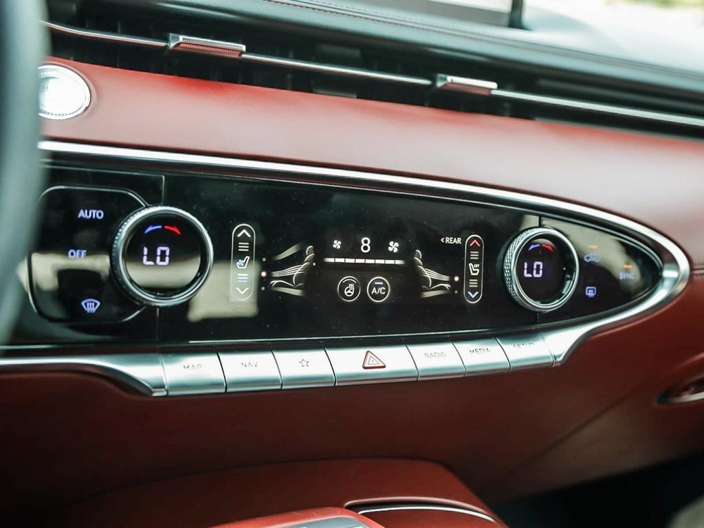 used 2023 Genesis GV70 car, priced at $53,597