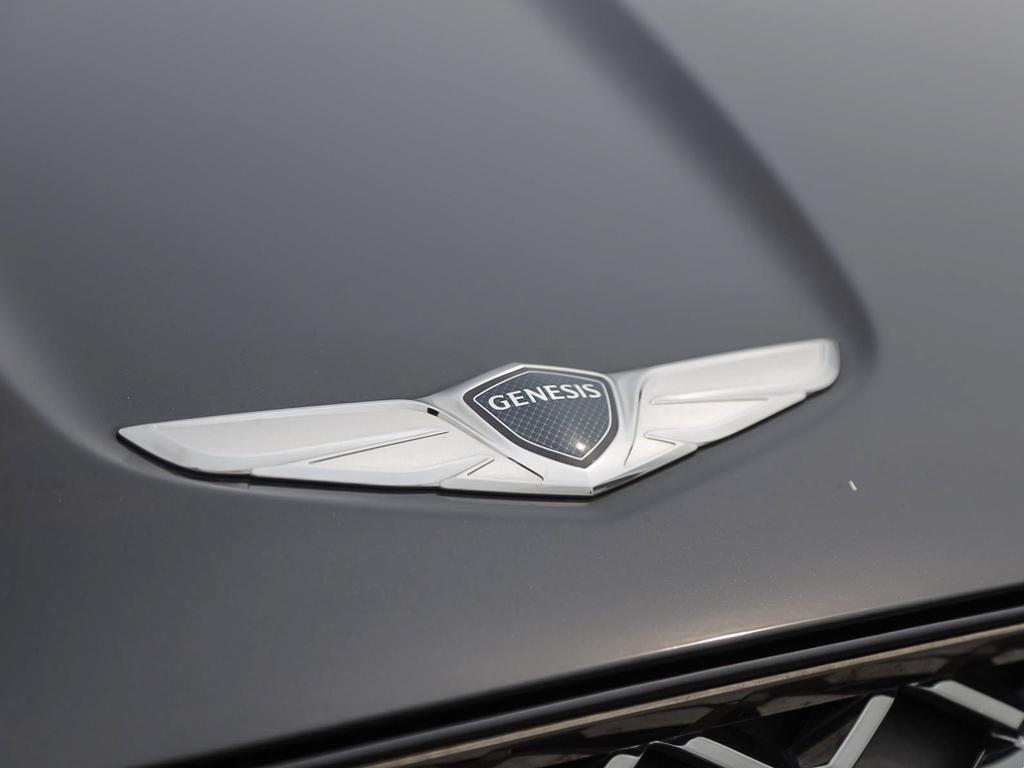 used 2022 Genesis GV70 car, priced at $27,597