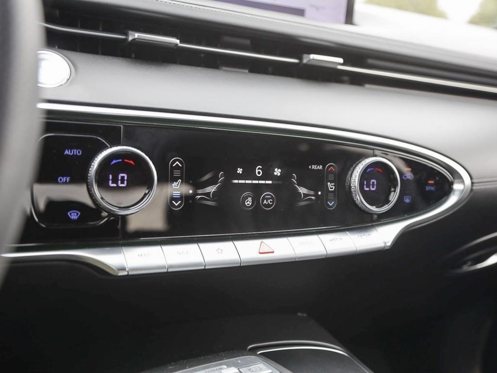 used 2022 Genesis GV70 car, priced at $27,597