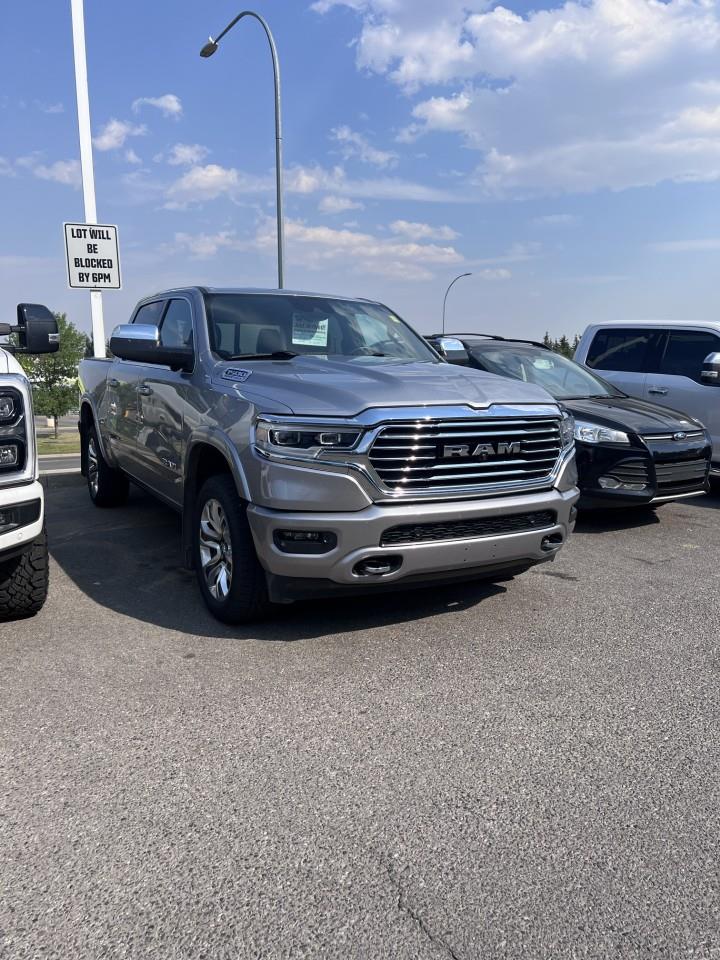 Silver 2024 RAM 1500 Pickup Truck Four-Wheel Drive 8-Speed Automatic