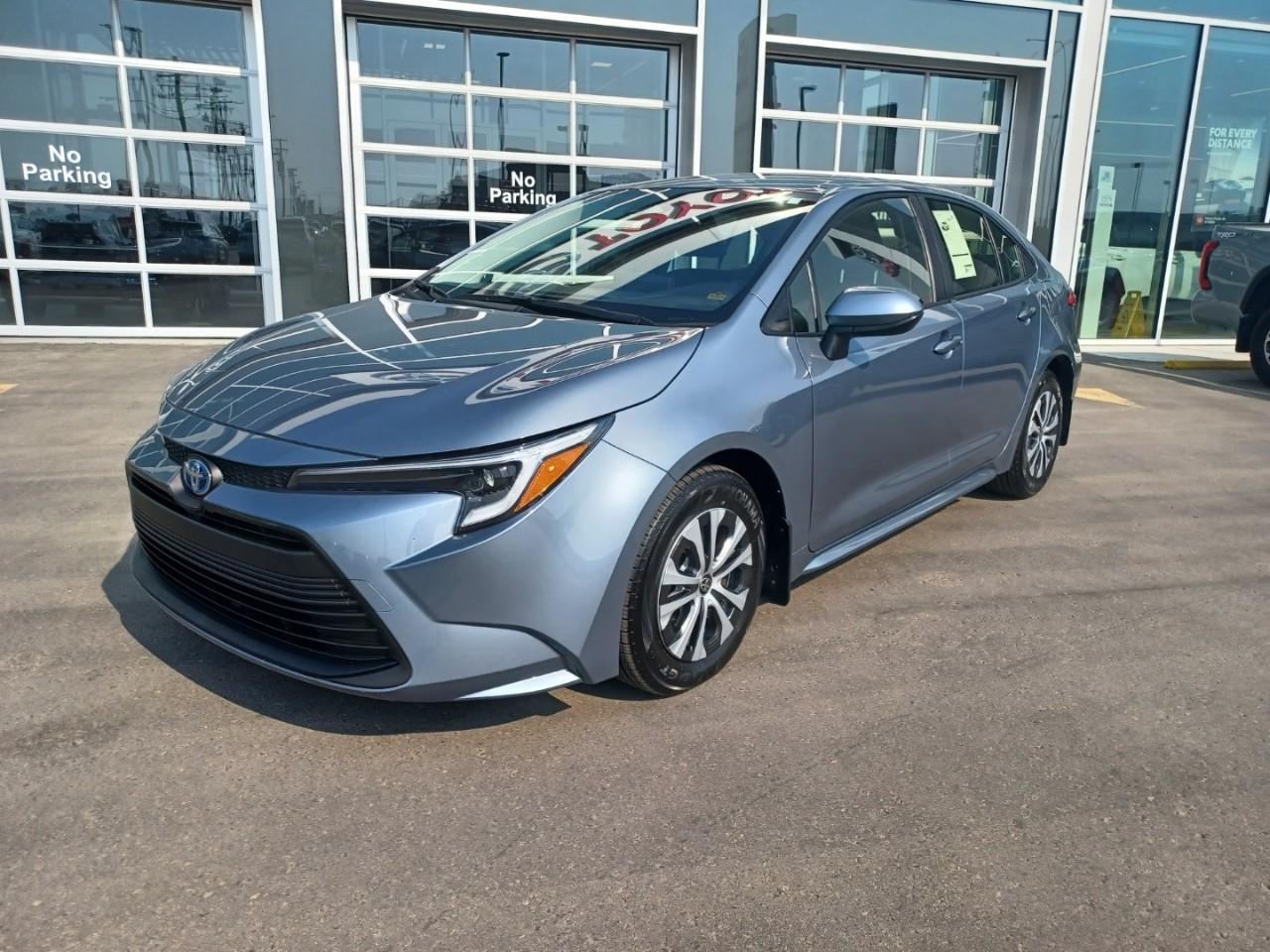 Blue 2025 Toyota Corolla Hybrid Sedan Front-Wheel Drive Continuously Variable Transmission