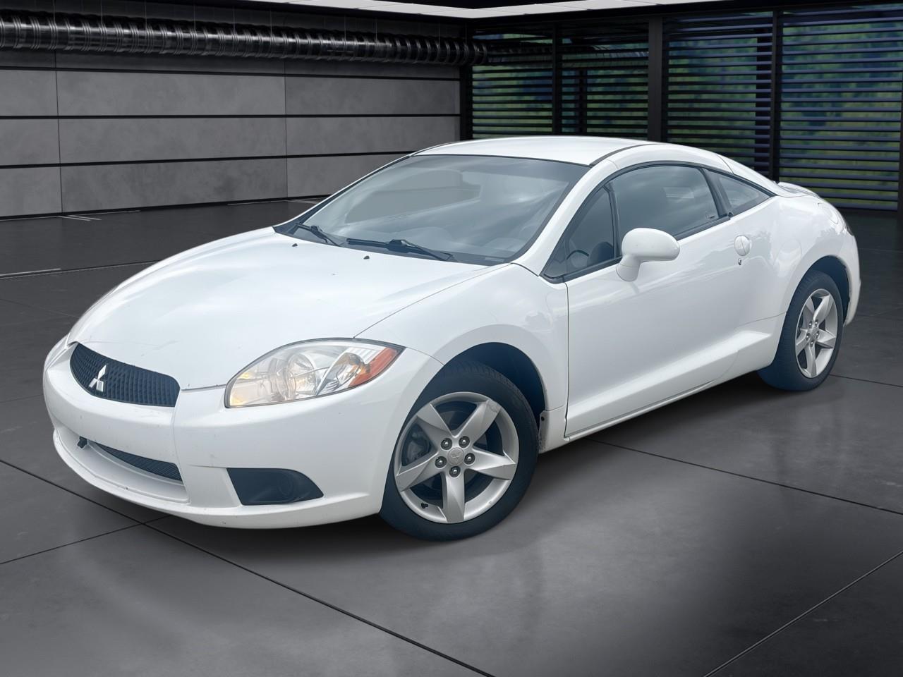 White 2009 Mitsubishi Eclipse Coupe Front-Wheel Drive 4-Speed Automatic