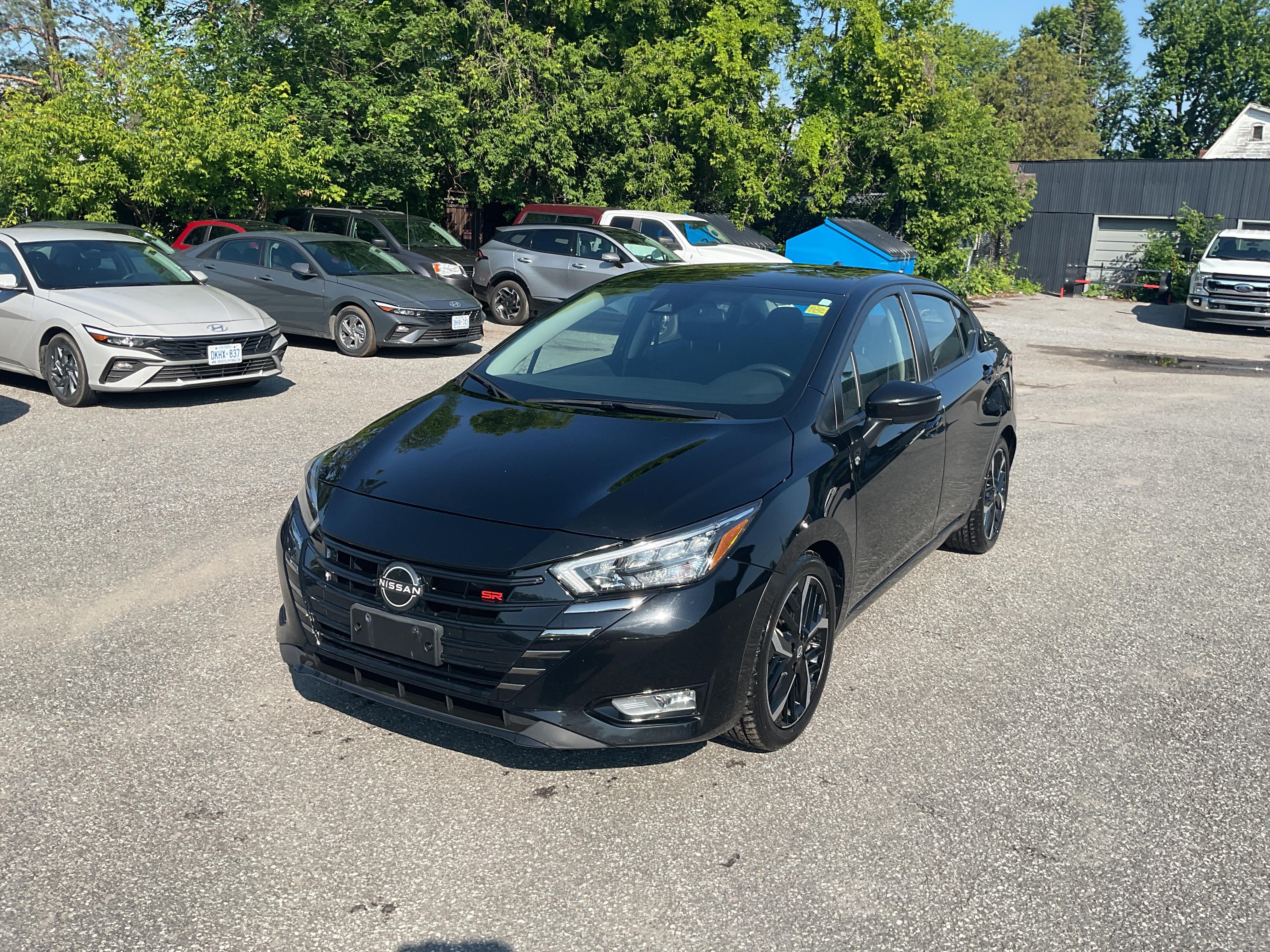 Black 2023 Nissan Versa Sedan Front-Wheel Drive Continuously Variable Transmission
