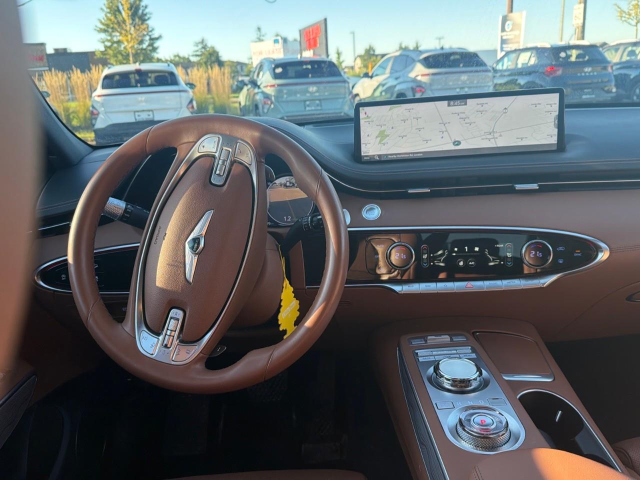 used 2024 Genesis GV70 car, priced at $50,697