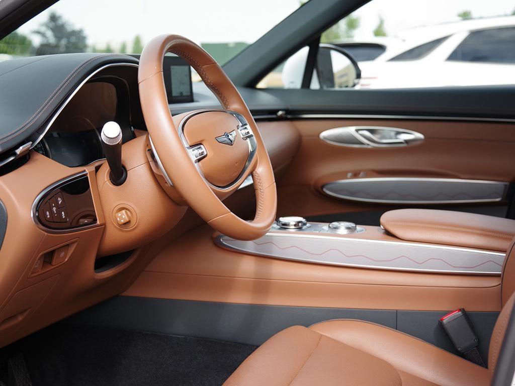 used 2024 Genesis GV70 car, priced at $50,697
