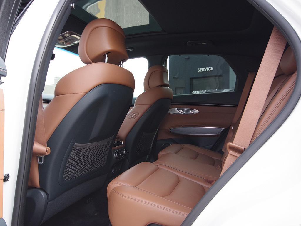 used 2024 Genesis GV70 car, priced at $50,697