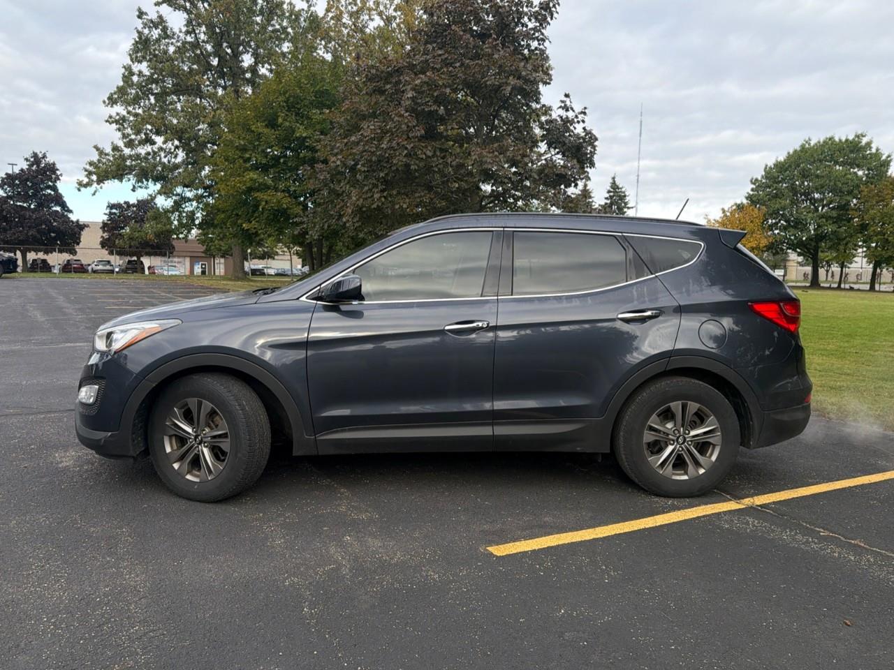 used 2015 Hyundai Santa Fe Sport car, priced at $15,697