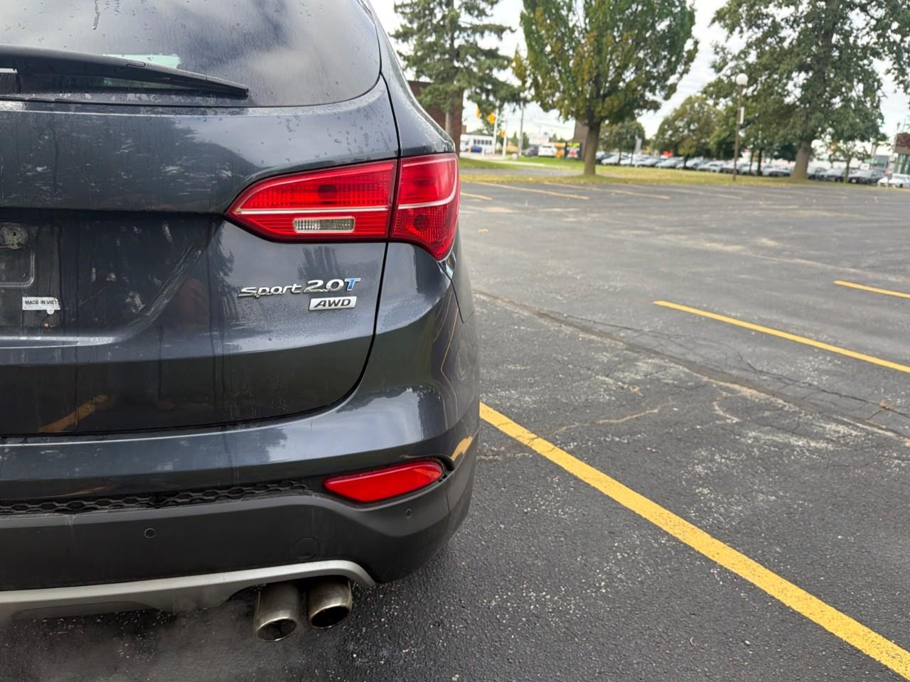 used 2015 Hyundai Santa Fe Sport car, priced at $15,697