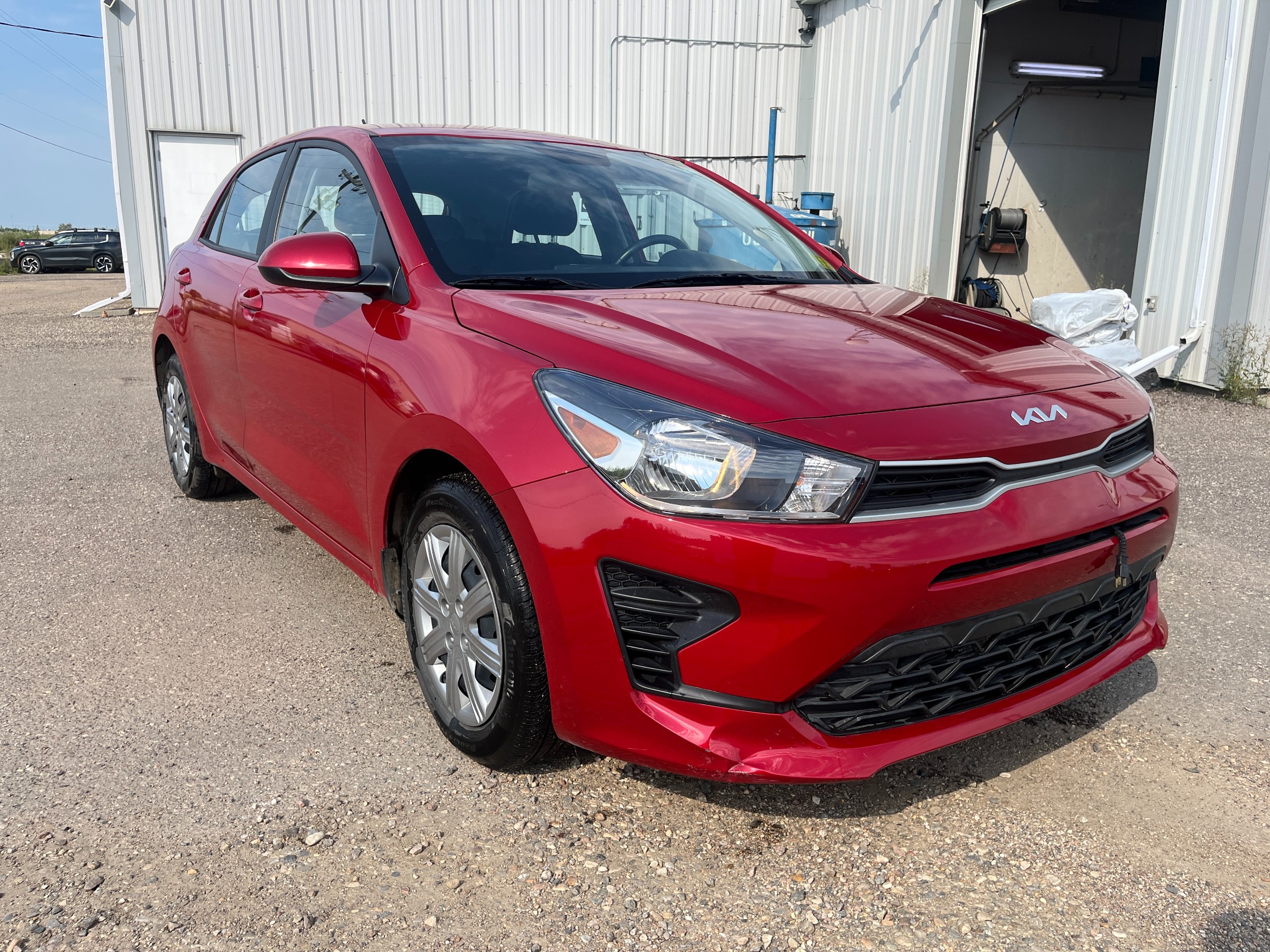 Red 2023 Kia Rio5 Wagon 6-Speed Manual