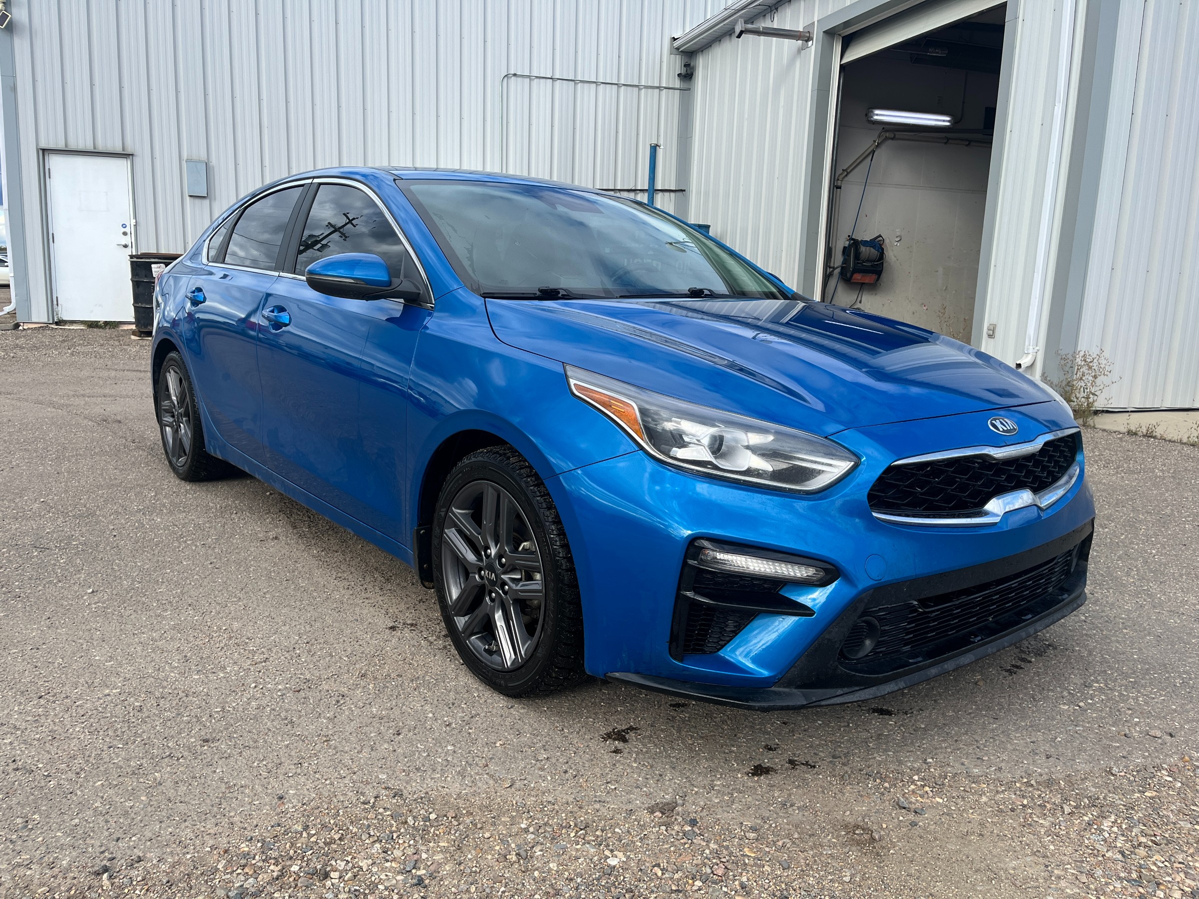 Blue 2021 Kia Forte Sedan Continuously Variable Transmission