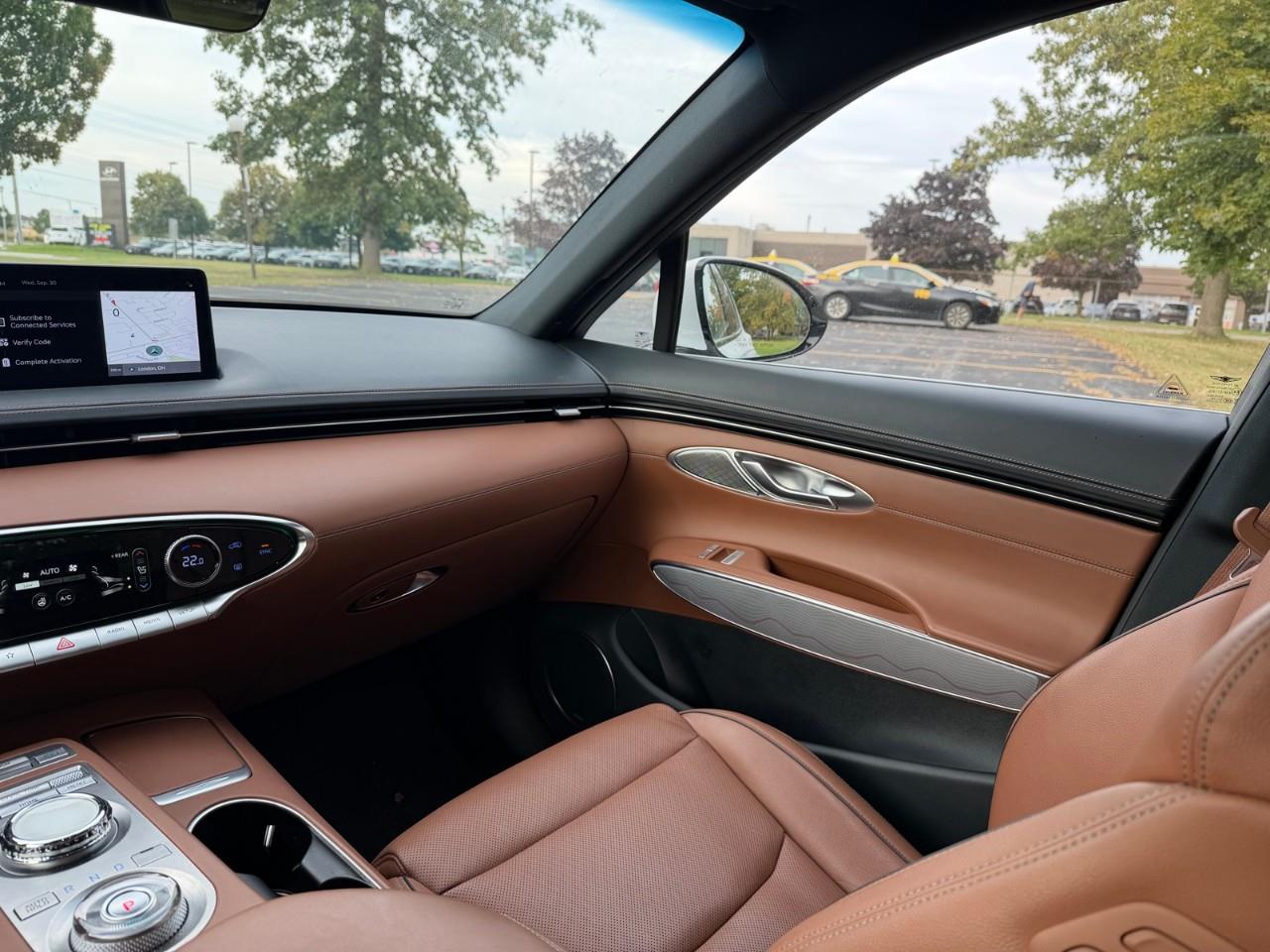 used 2023 Genesis GV70 car, priced at $37,697