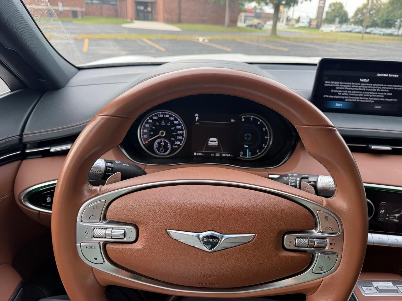 used 2023 Genesis GV70 car, priced at $37,697