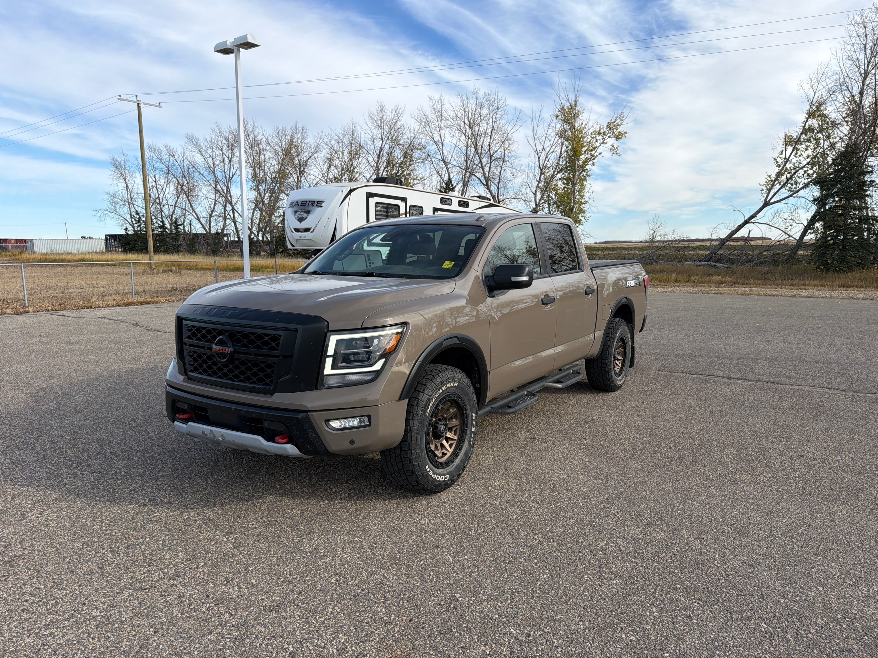 Brown 2020 Nissan Titan Pickup Truck Four-Wheel Drive 9-Speed Automatic