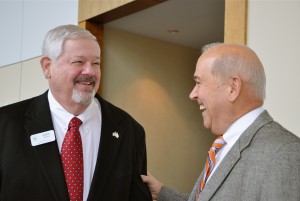 Former Gwinnett County Commissioner Mike Berg (left), who now chairs the Dawson County Board of Commissioners, catches up with former Gwinnett County commission Chairman Wayne Hill. Credit: Donita Pendered