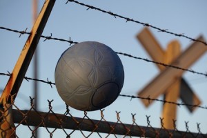One World Futbol and barbed wire (Credit: Rory Earnshaw)