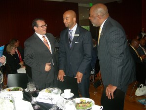Gwinnett Chamber's Nick Masino visits with MARTA general manager Keith Parker and Doug Hooker, executive director of the Atlanta Regional Commission
