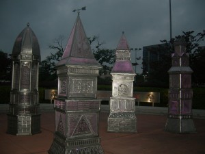 Artistic metal replicas of Victorian houses that used to stand in downtown Houston now adorn public space near Toyota Arena (Photo: Maria Saporta)