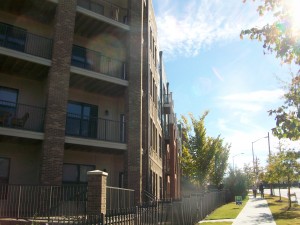 Atlanta is rebuilding the streetscape of Joseph E. Lowery Boulevard in West End so it will be as attractive as this segment, in front of the Sky Lofts condo complex, shown in this photo taken in November 2010. Credit: David Pendered