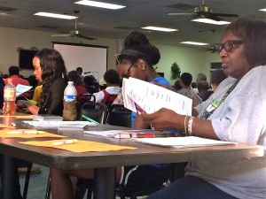 The conveners of the Aug. 14 forum to discuss Fort McPherson's redevelopment provided for volunteers to distribute materials. Credit: Donita Pendered