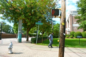Trees shade brick sidewalks on the AUC campus near the Lee Street bridge, which leads to West End. Credit: Donita Pendered