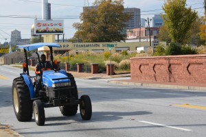 A tractor happened to be one of a few vehicles that traveled along Memorial Drive Monday afternoon. Credit: Donita Pendered