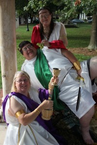Geocachers seek coded locations on their own or in groups, and some of their gatherings get creative. Team Sheppard (from left, Pat, Randy and daughter Ellen) dressed up for a major geocaching event in Rome. (Photo courtesy of Pat Sheppard).