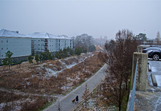 Snow falling on the BeltLine Eastside trail taken from the top of the Freedom Heights condos parking deck.