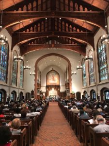 A few hundred folks filled St. Luke's Episcopal Church on Wednesday to hear mayoral candidates discuss their ideas on housing affordability. Credit: Kelly Jordan