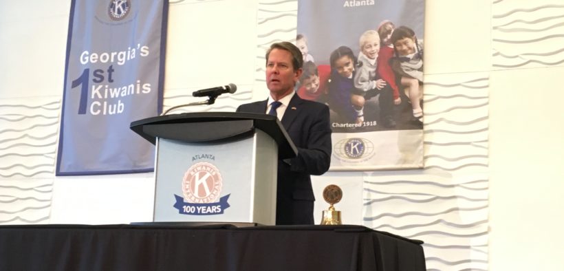 Brian Kemp at a podium at Kiwanis meeting