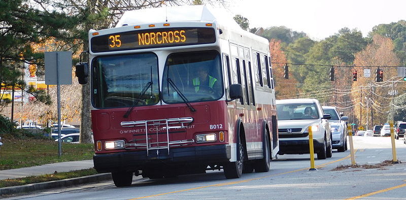 Gwinnett County Transit 2002 Orion VII CNG on the 35 Bus on Spalding Drive heading to Doraville MARTA Station