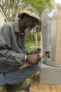 Gregory Warnack, a.k.a. "Mr Imagination," works at his home in northwest Atlanta