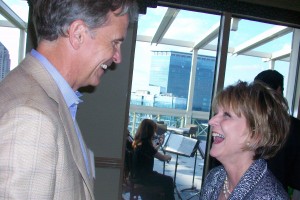 Susan Mendheim shares cheer with Charles Brewer, a Midtown Alliance director and chairman of Charles Brewer Enterprises. Susan Mendheim shares cheer with Charles Brewer, a Midtown Alliance director and chairman of Charles Brewer Enterprises.