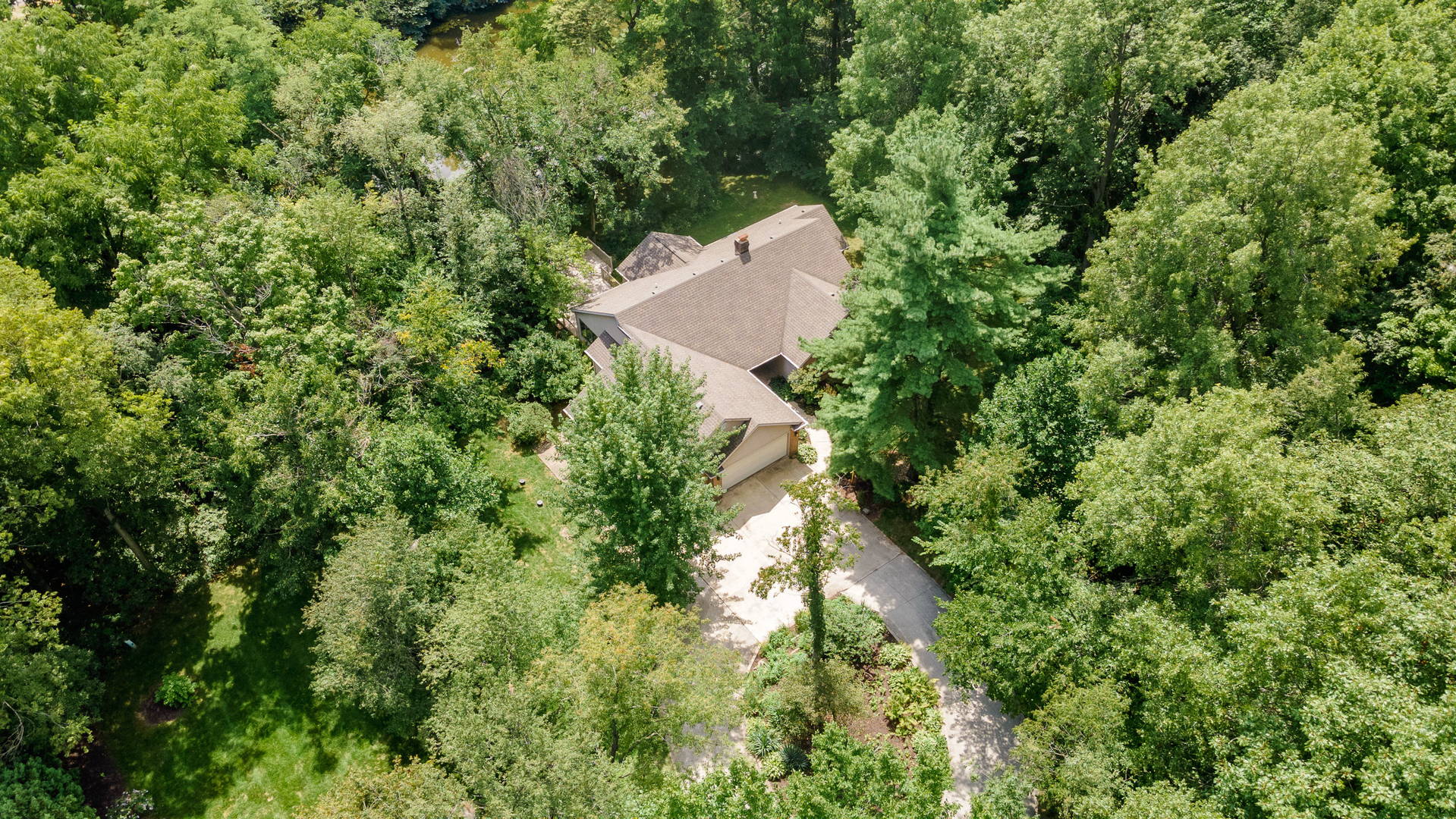 Grabill, Indiana Ranch Home with 3.68 +/ Acres and Pond Scheerer