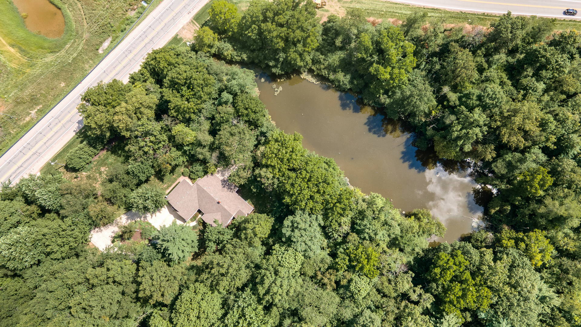 Grabill, Indiana Ranch Home with 3.68 +/ Acres and Pond Scheerer