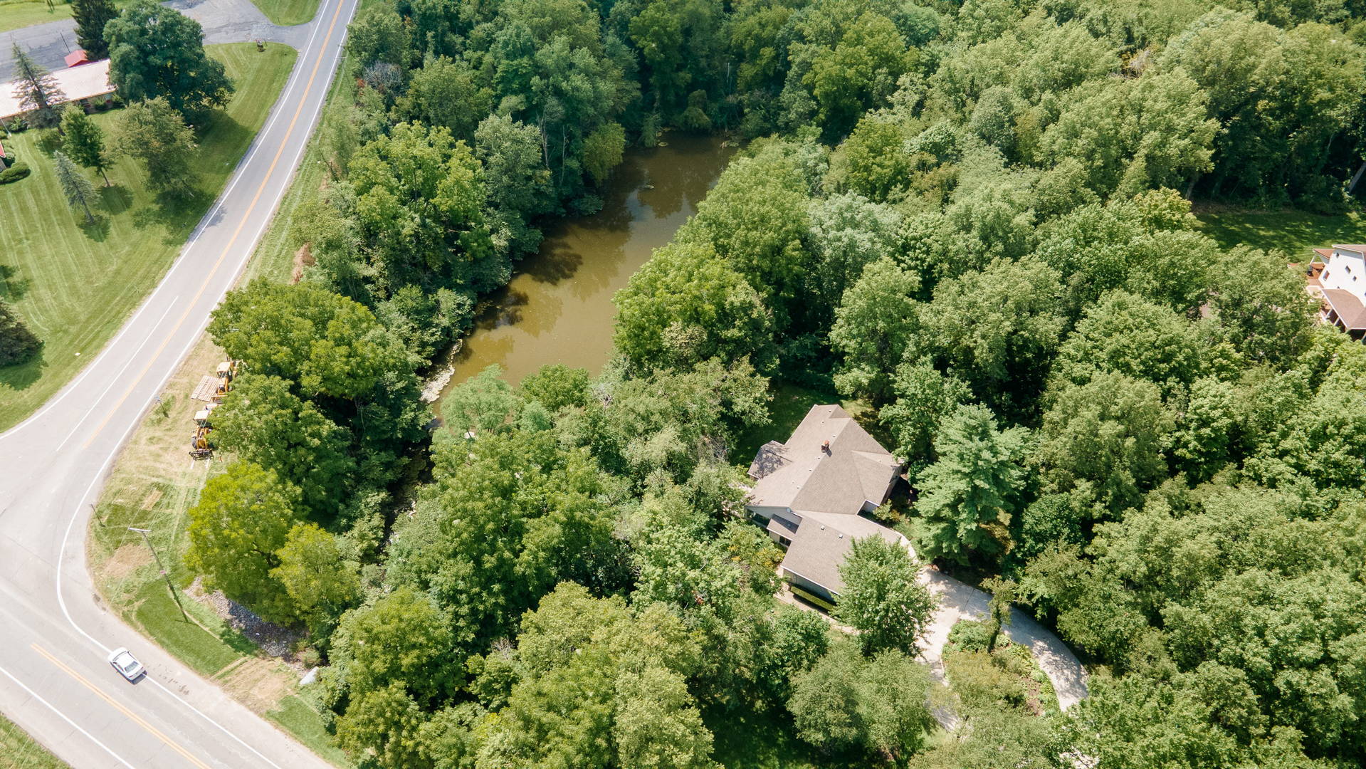 Grabill, Indiana Ranch Home with 3.68 +/ Acres and Pond Scheerer