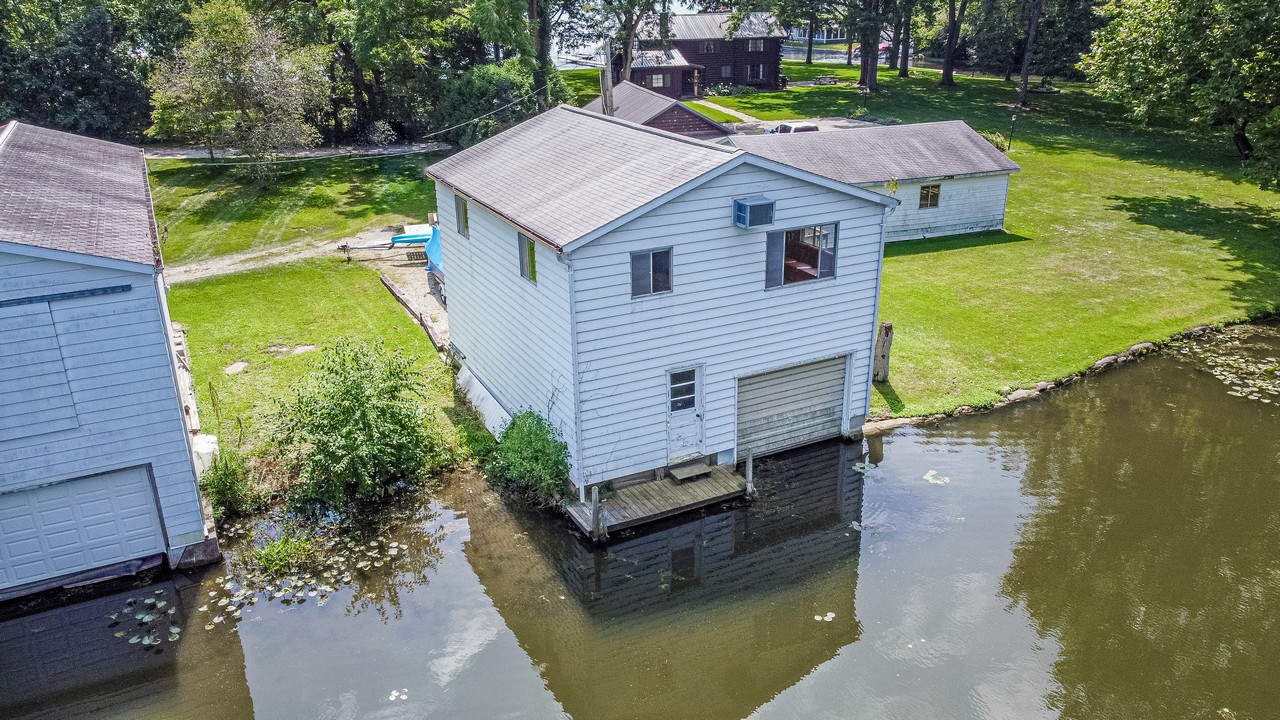 Lakefront Home, Boat House, & Vacant Lots Selling in Multi Tract