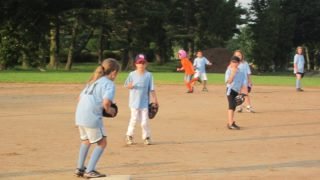 Peter Smith's album, Niece playing baseball