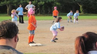 Peter Smith's album, Niece playing baseball