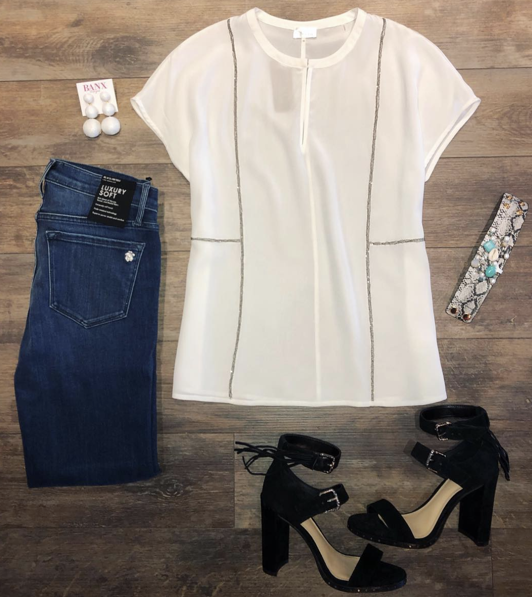 Women’s Spring Fashion Found in Boutiques | Ecru Silk Blouse w/Chain Detail & Black Orchid Soft Skinny Jeans Ecru Silk Blouse w/Chain Detail & Black Orchid Soft Skinny Jeans