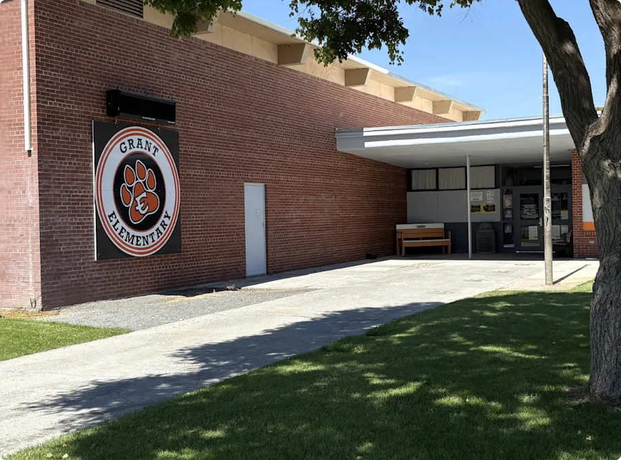 front of red brick school building