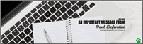 A laptop keyboard and notepad with a pen are arranged on a desk.