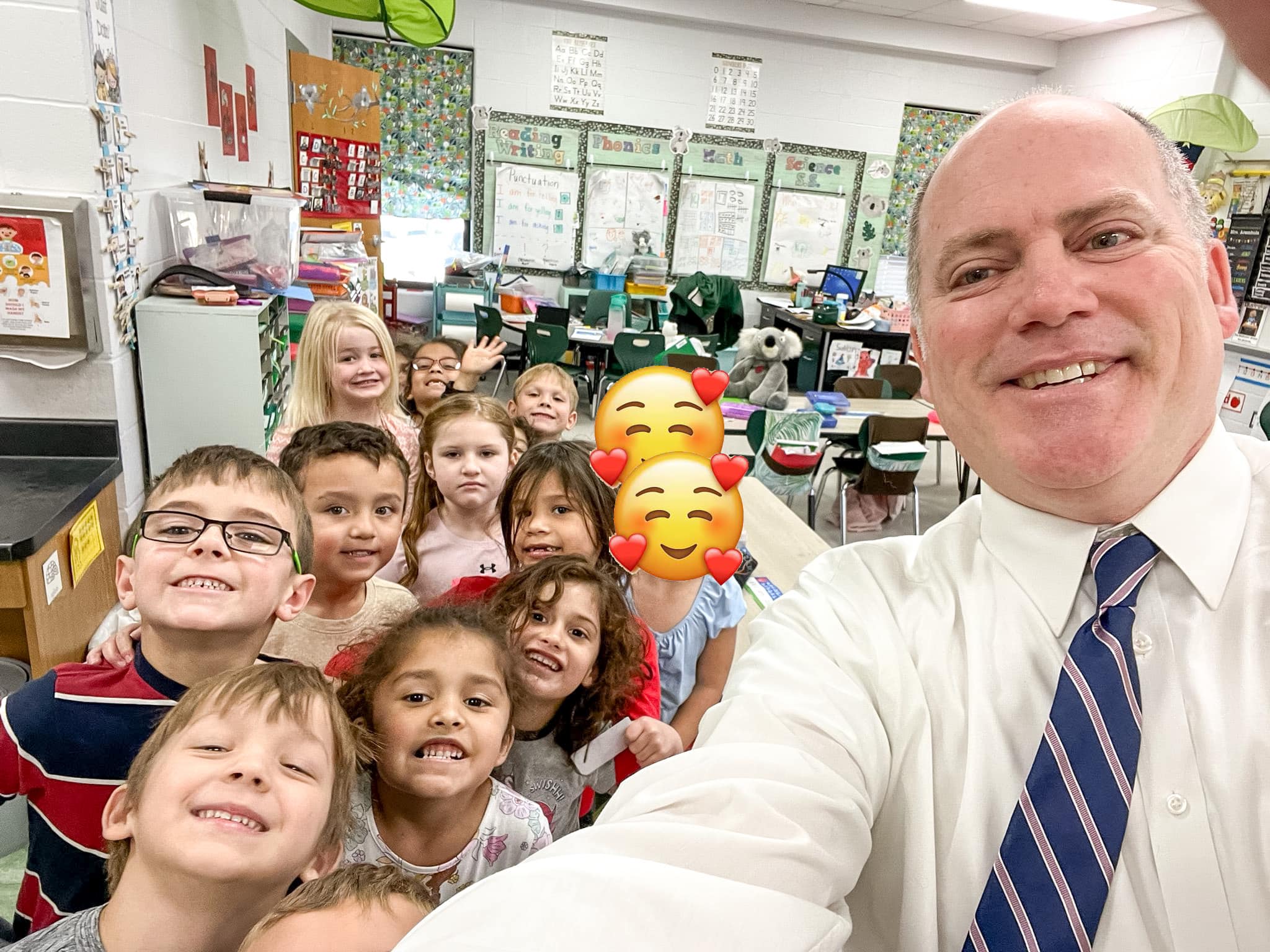 superintendent and students in classroom setting