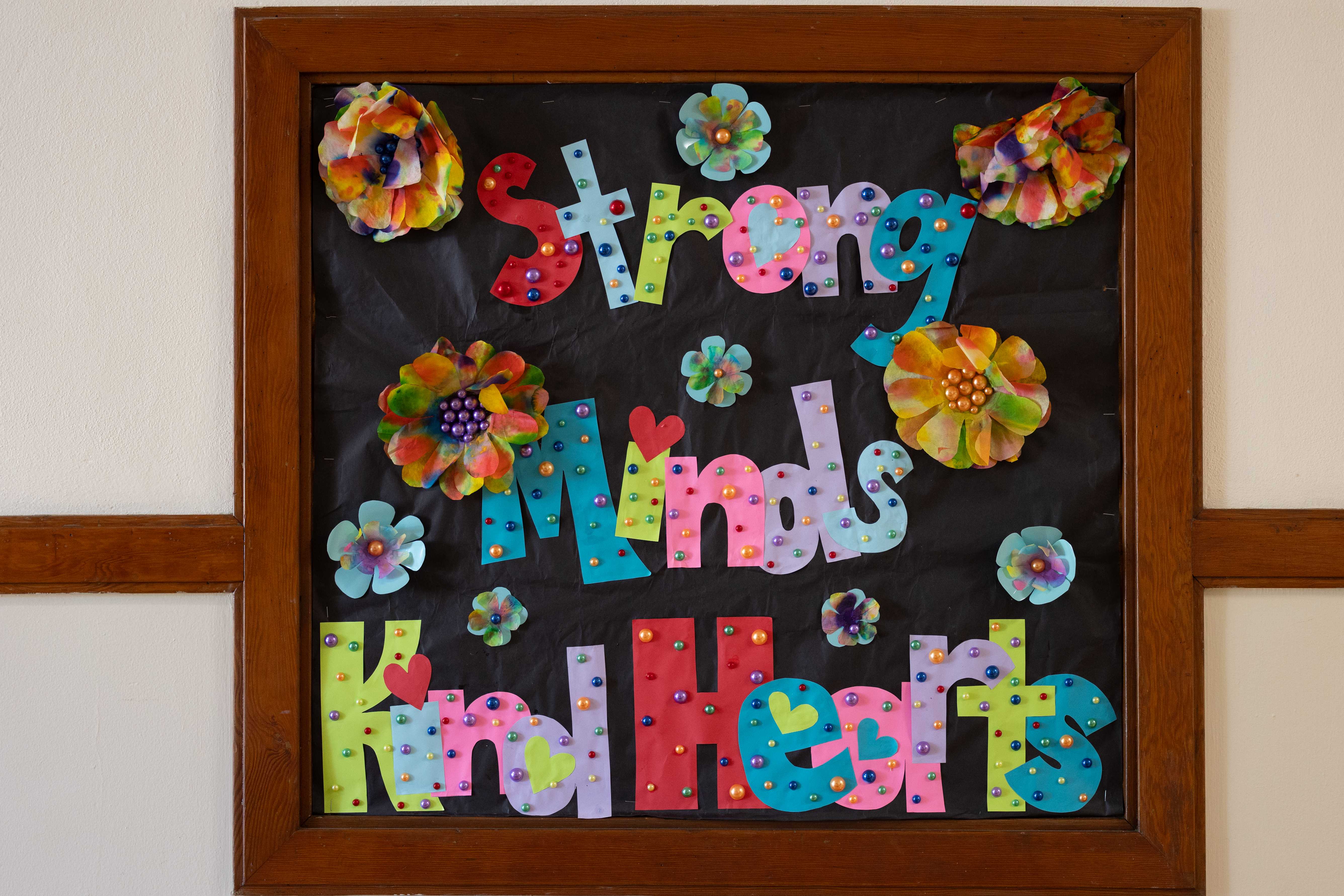Board of colorful flowers at school
